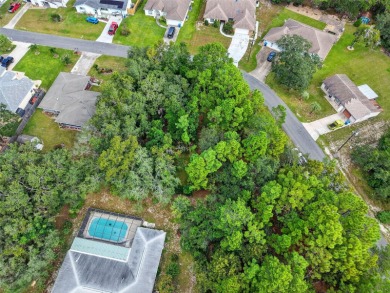 BUILD YOUR DREAM HOME on this spacious 0.40-acre CORNER lot on Oak Hills Country Club in Florida - for sale on GolfHomes.com, golf home, golf lot