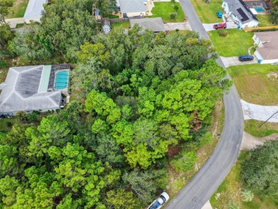 BUILD YOUR DREAM HOME on this spacious 0.40-acre CORNER lot on Oak Hills Country Club in Florida - for sale on GolfHomes.com, golf home, golf lot