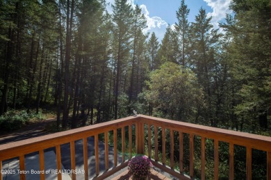 Surrounded by towering evergreens and endless mountain views on Star Valley RV Golf Course in Wyoming - for sale on GolfHomes.com, golf home, golf lot