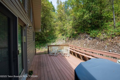 Surrounded by towering evergreens and endless mountain views on Star Valley RV Golf Course in Wyoming - for sale on GolfHomes.com, golf home, golf lot