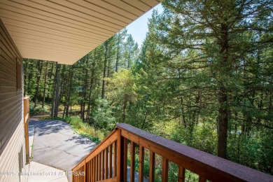 Surrounded by towering evergreens and endless mountain views on Star Valley RV Golf Course in Wyoming - for sale on GolfHomes.com, golf home, golf lot