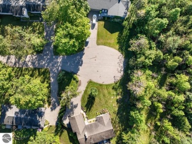 Tucked away on a quiet cul-de-sac just behind the Bay View Golf on Petoskey-Bay View Country Club in Michigan - for sale on GolfHomes.com, golf home, golf lot