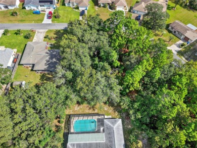 BUILD YOUR DREAM HOME on this spacious 0.40-acre CORNER lot on Oak Hills Country Club in Florida - for sale on GolfHomes.com, golf home, golf lot