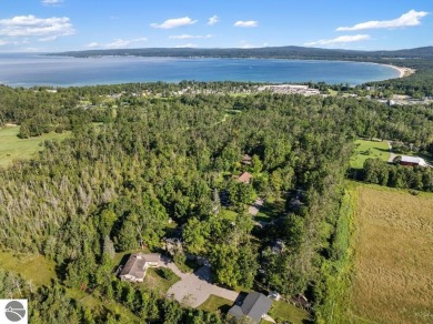 Tucked away on a quiet cul-de-sac just behind the Bay View Golf on Petoskey-Bay View Country Club in Michigan - for sale on GolfHomes.com, golf home, golf lot