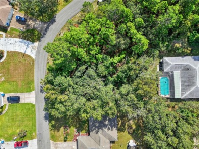 BUILD YOUR DREAM HOME on this spacious 0.40-acre CORNER lot on Oak Hills Country Club in Florida - for sale on GolfHomes.com, golf home, golf lot