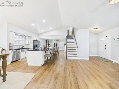 Experience luxury and comfort in this beautiful 2-story home on Desert Hawk At Pueblo West in Colorado - for sale on GolfHomes.com, golf home, golf lot