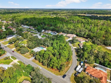 BUILD YOUR DREAM HOME on this spacious 0.40-acre CORNER lot on Oak Hills Country Club in Florida - for sale on GolfHomes.com, golf home, golf lot