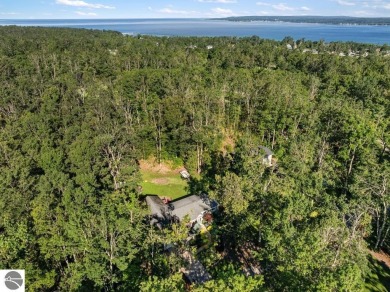 Tucked away on a quiet cul-de-sac just behind the Bay View Golf on Petoskey-Bay View Country Club in Michigan - for sale on GolfHomes.com, golf home, golf lot