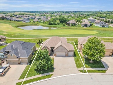 This gorgeous home is located on the 9th fairway of the golf on Golf Club of Creekmoor in Missouri - for sale on GolfHomes.com, golf home, golf lot