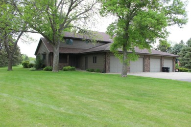 Check out this gorgeous two-story twin home with a stunning on Moccasin Creek Country Club in South Dakota - for sale on GolfHomes.com, golf home, golf lot