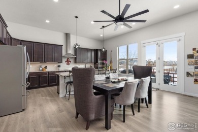 This stunning corner-lot home built in 2019 is a must-see! on Raindance National Golf Course in Colorado - for sale on GolfHomes.com, golf home, golf lot