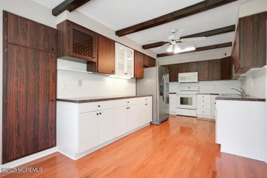 This home features hardwood floors, gas fireplace, located on a on Toms River Country Club in New Jersey - for sale on GolfHomes.com, golf home, golf lot