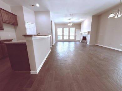 Lovely home with beautiful golf course views. carpet and on WestRidge Golf Course in Texas - for sale on GolfHomes.com, golf home, golf lot
