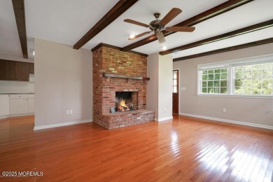 This home features hardwood floors, gas fireplace, located on a on Toms River Country Club in New Jersey - for sale on GolfHomes.com, golf home, golf lot