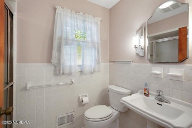 This home features hardwood floors, gas fireplace, located on a on Toms River Country Club in New Jersey - for sale on GolfHomes.com, golf home, golf lot