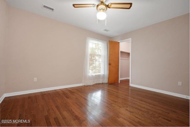 This home features hardwood floors, gas fireplace, located on a on Toms River Country Club in New Jersey - for sale on GolfHomes.com, golf home, golf lot