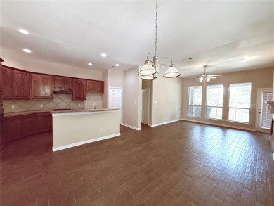 Lovely home with beautiful golf course views. carpet and on WestRidge Golf Course in Texas - for sale on GolfHomes.com, golf home, golf lot