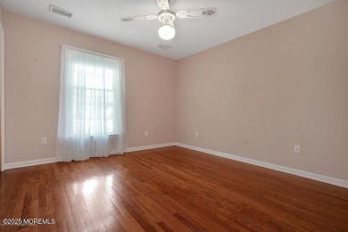 This home features hardwood floors, gas fireplace, located on a on Toms River Country Club in New Jersey - for sale on GolfHomes.com, golf home, golf lot