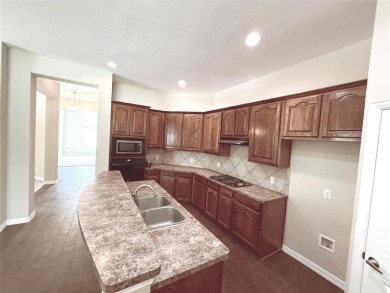 Lovely home with beautiful golf course views. carpet and on WestRidge Golf Course in Texas - for sale on GolfHomes.com, golf home, golf lot