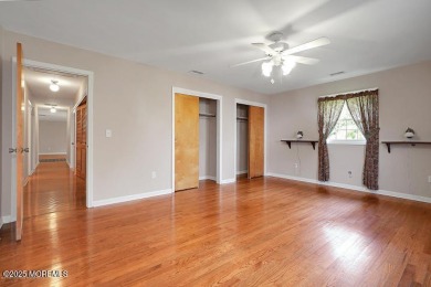 This home features hardwood floors, gas fireplace, located on a on Toms River Country Club in New Jersey - for sale on GolfHomes.com, golf home, golf lot