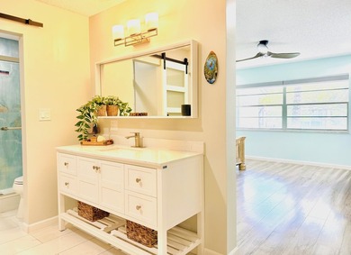 You'd be hard pressed a condo like this OVERSIZED 1900 FT OPEN & on Woodmont Country Club in Florida - for sale on GolfHomes.com, golf home, golf lot