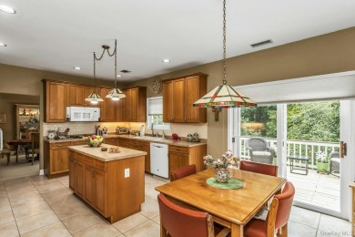 This Dorado Estate home has a full lower level walk out basement on Hamlet Golf and Country Club in New York - for sale on GolfHomes.com, golf home, golf lot