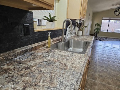 So many things to LOVE about this home!  Located on a corner lot on The Golf Club At Johnson Ranch in Arizona - for sale on GolfHomes.com, golf home, golf lot
