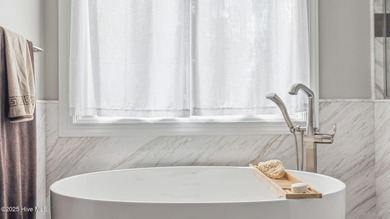 Stunning all-brick home in Mid-South! Beautifully maintained on Mid South Club in North Carolina - for sale on GolfHomes.com, golf home, golf lot