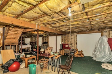 This Dorado Estate home has a full lower level walk out basement on Hamlet Golf and Country Club in New York - for sale on GolfHomes.com, golf home, golf lot