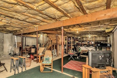 This Dorado Estate home has a full lower level walk out basement on Hamlet Golf and Country Club in New York - for sale on GolfHomes.com, golf home, golf lot