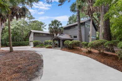 Nestled on a half-acre homesite beneath majestic oak trees on The Seabrook Island Club in South Carolina - for sale on GolfHomes.com, golf home, golf lot