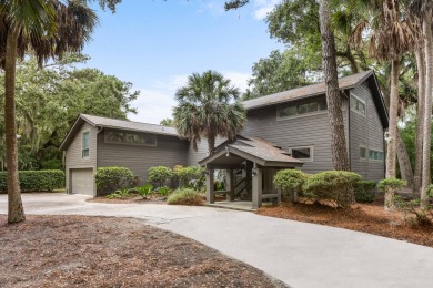 Nestled on a half-acre homesite beneath majestic oak trees on The Seabrook Island Club in South Carolina - for sale on GolfHomes.com, golf home, golf lot