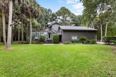 Nestled on a half-acre homesite beneath majestic oak trees on The Seabrook Island Club in South Carolina - for sale on GolfHomes.com, golf home, golf lot