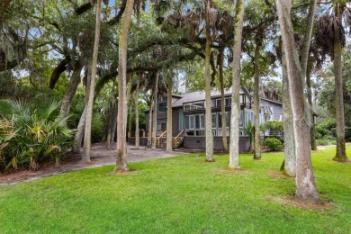 Nestled on a half-acre homesite beneath majestic oak trees on The Seabrook Island Club in South Carolina - for sale on GolfHomes.com, golf home, golf lot