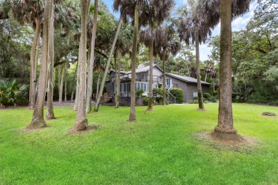 Nestled on a half-acre homesite beneath majestic oak trees on The Seabrook Island Club in South Carolina - for sale on GolfHomes.com, golf home, golf lot