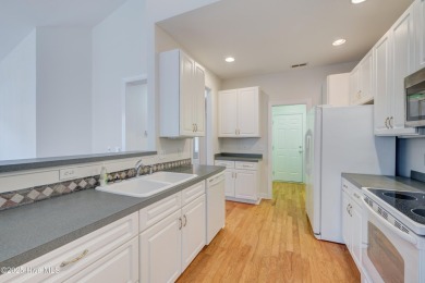 Freshly painted inside, this 3-bedroom, 2-bath townhome in the on Magnolia Greens Golf Plantation in North Carolina - for sale on GolfHomes.com, golf home, golf lot