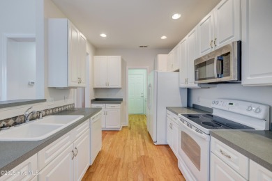 Freshly painted inside, this 3-bedroom, 2-bath townhome in the on Magnolia Greens Golf Plantation in North Carolina - for sale on GolfHomes.com, golf home, golf lot