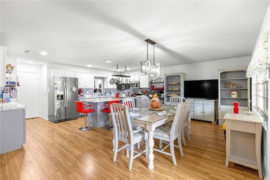 This spacious, end unit Bostonian is located in the much sought on On Top of the World Golf Course in Florida - for sale on GolfHomes.com, golf home, golf lot