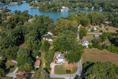 This Salt Box-inspired beauty, echoes the cozy charm of early on Tides Inn Par 3 Course in Virginia - for sale on GolfHomes.com, golf home, golf lot