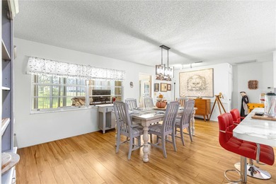 This spacious, end unit Bostonian is located in the much sought on On Top of the World Golf Course in Florida - for sale on GolfHomes.com, golf home, golf lot