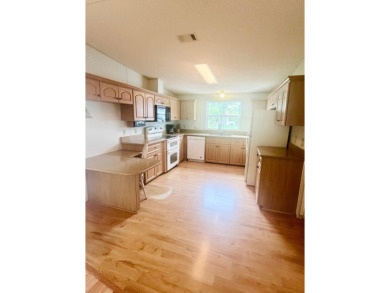 **Beautiful Home on the 17th green in Pine Lakes Country Club** on Pine Lakes Country Club in Florida - for sale on GolfHomes.com, golf home, golf lot