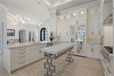 Sun-Soaked Sophistication on the Shores of Miromar Lakes! Tucked on Miromar Lakes Golf Club in Florida - for sale on GolfHomes.com, golf home, golf lot