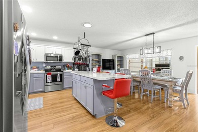 This spacious, end unit Bostonian is located in the much sought on On Top of the World Golf Course in Florida - for sale on GolfHomes.com, golf home, golf lot