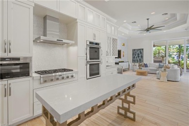 Sun-Soaked Sophistication on the Shores of Miromar Lakes! Tucked on Miromar Lakes Golf Club in Florida - for sale on GolfHomes.com, golf home, golf lot