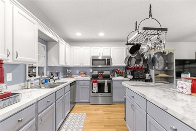 This spacious, end unit Bostonian is located in the much sought on On Top of the World Golf Course in Florida - for sale on GolfHomes.com, golf home, golf lot