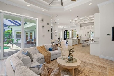 Sun-Soaked Sophistication on the Shores of Miromar Lakes! Tucked on Miromar Lakes Golf Club in Florida - for sale on GolfHomes.com, golf home, golf lot
