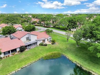 Beautiful 3 bed, 2 bath corner unit townhome in The Lakes of on Deer Creek Golf Club in Florida - for sale on GolfHomes.com, golf home, golf lot