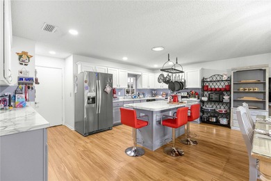 This spacious, end unit Bostonian is located in the much sought on On Top of the World Golf Course in Florida - for sale on GolfHomes.com, golf home, golf lot