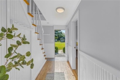 This Salt Box-inspired beauty, echoes the cozy charm of early on Tides Inn Par 3 Course in Virginia - for sale on GolfHomes.com, golf home, golf lot