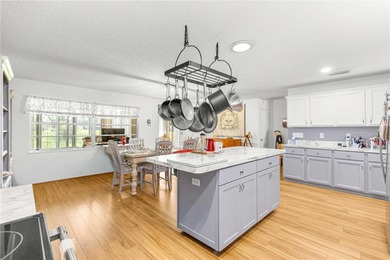 This spacious, end unit Bostonian is located in the much sought on On Top of the World Golf Course in Florida - for sale on GolfHomes.com, golf home, golf lot